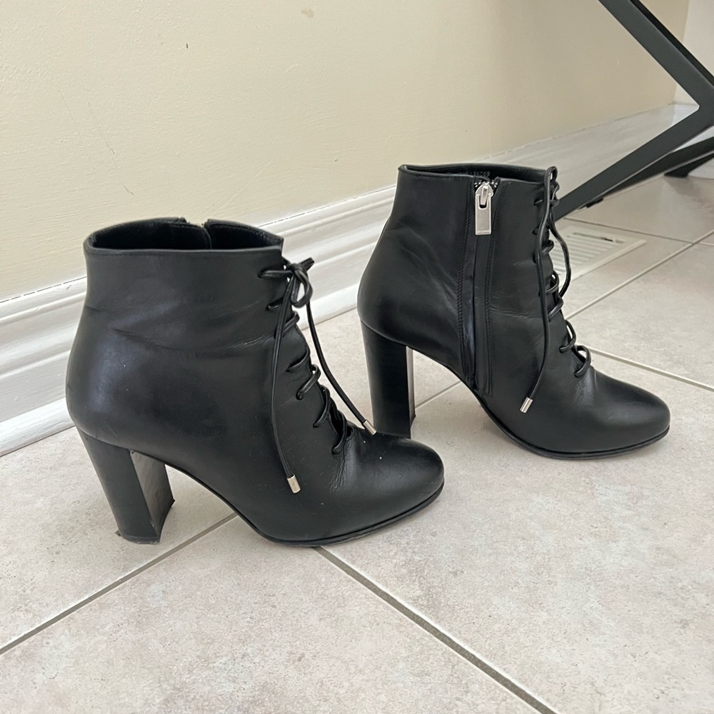 The Kooples black lace up boot heels